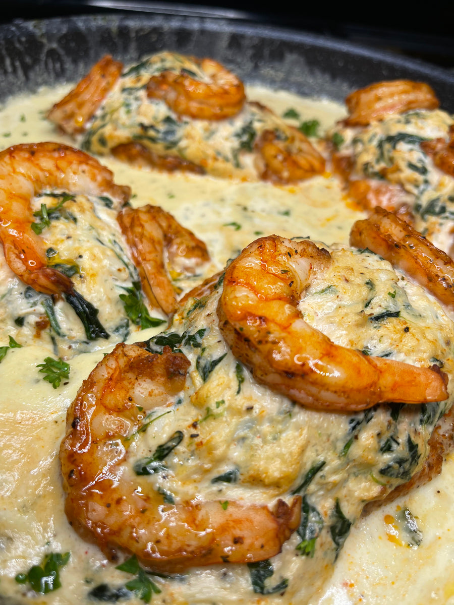 Spinach and crab stuffed salmon with lemon cream sauce Chef China White